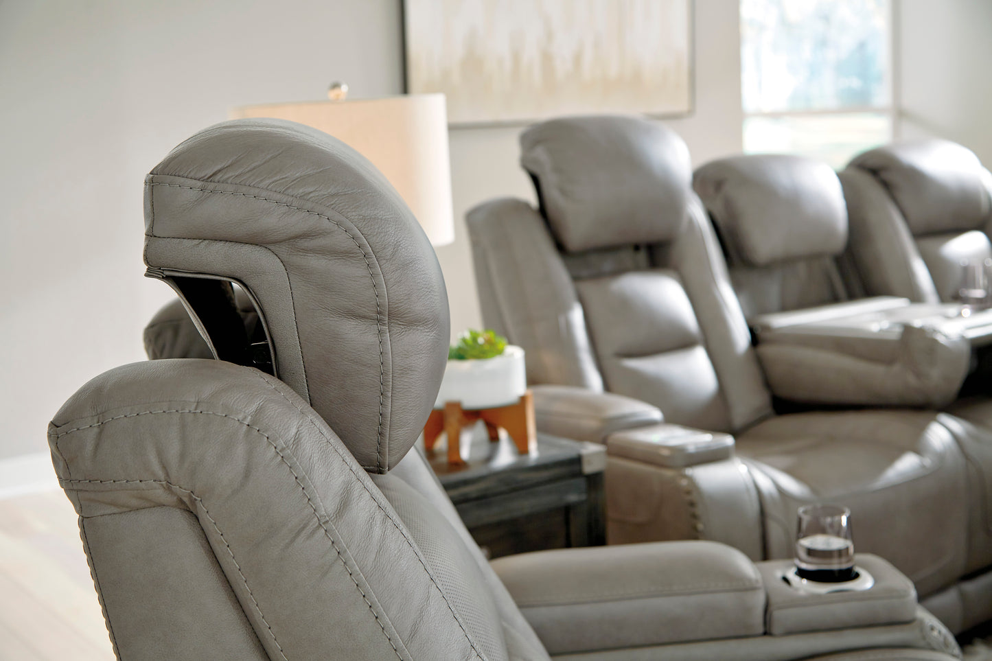 The Man-Den Gray Triple Power Reclining Sofa & Loveseat