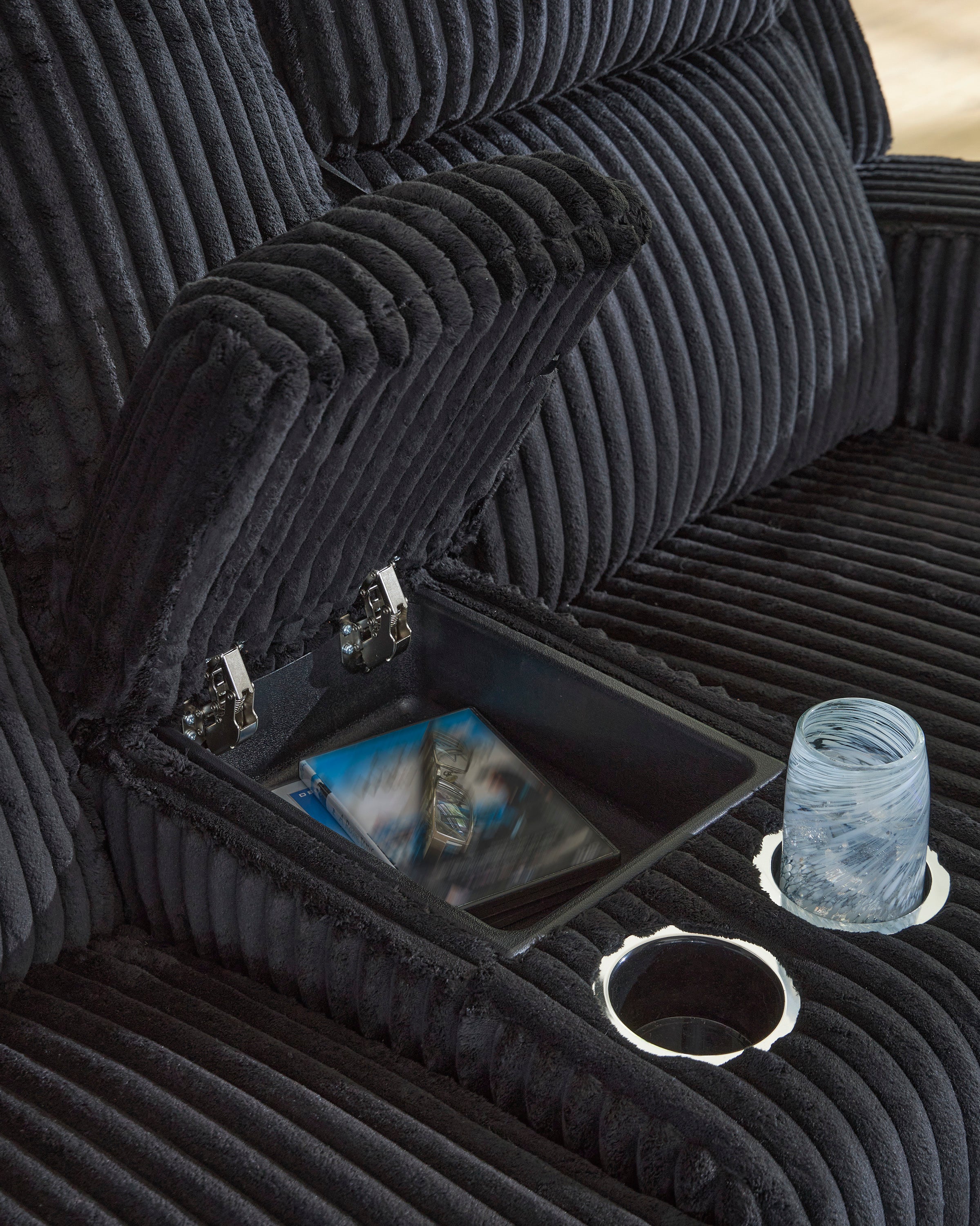 TwinBrooke Power Reclining Black Loveseat with Console and Adjustable Headrest