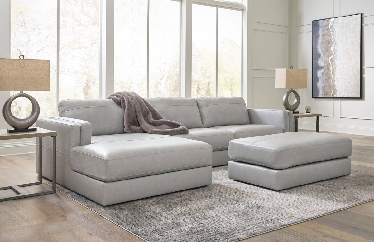 Amiata 2 - Piece Leather Sectional w/Chaise - Rooms For Less Furniture Outlet