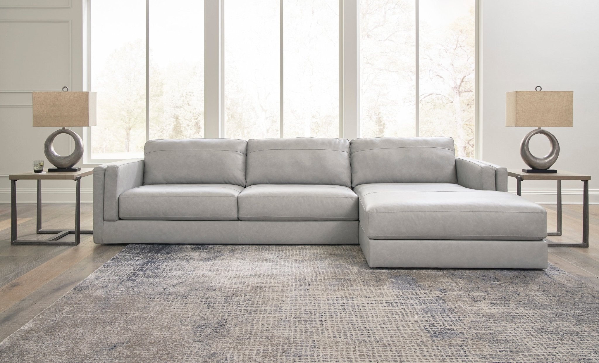 Amiata 2 - Piece Leather Sectional with Chaise - Rooms For Less Furniture Outlet