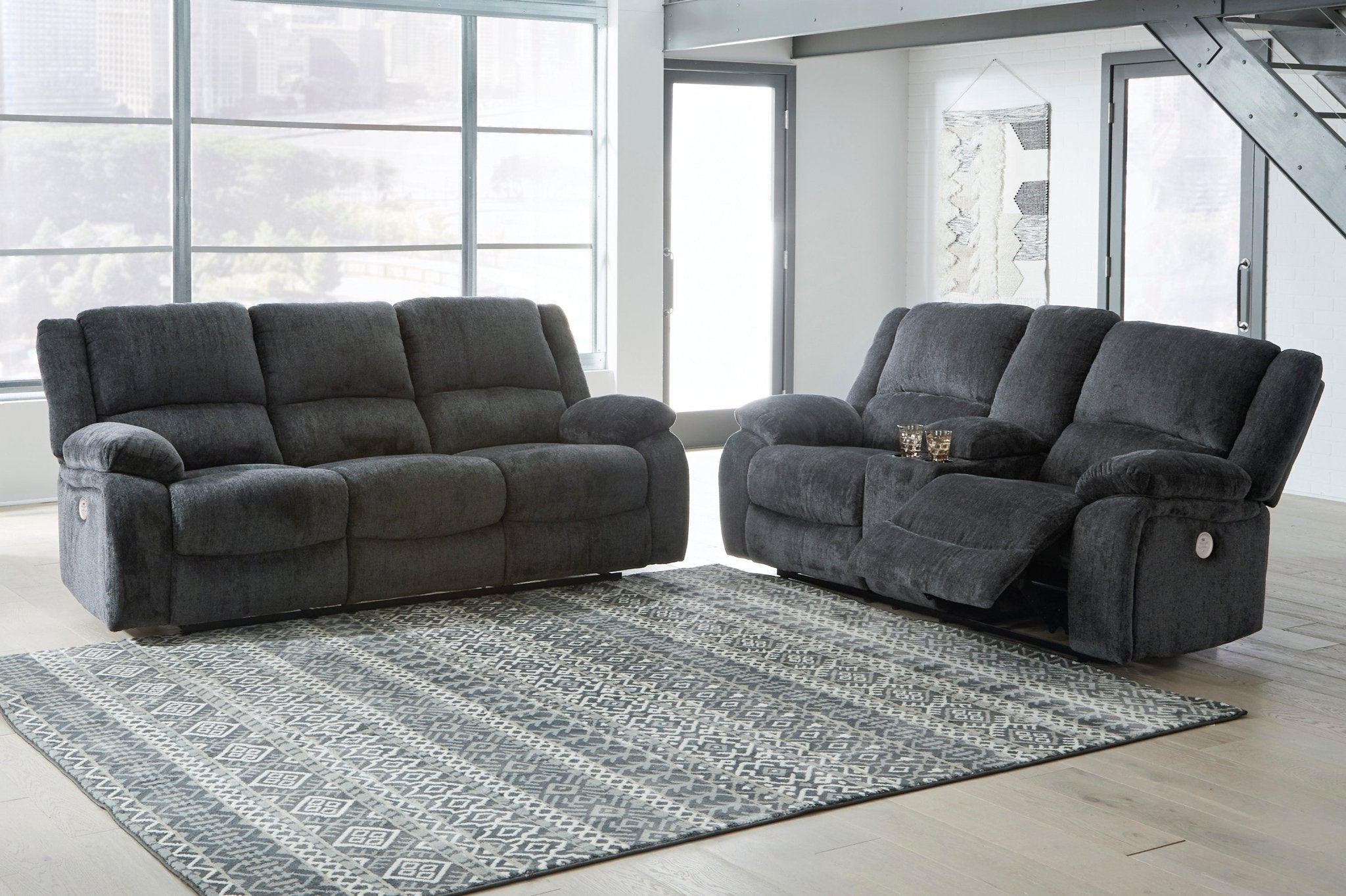 Draycoll Slate Manual Reclining Sofa and Loveseat - Rooms For Less Furniture Outlet