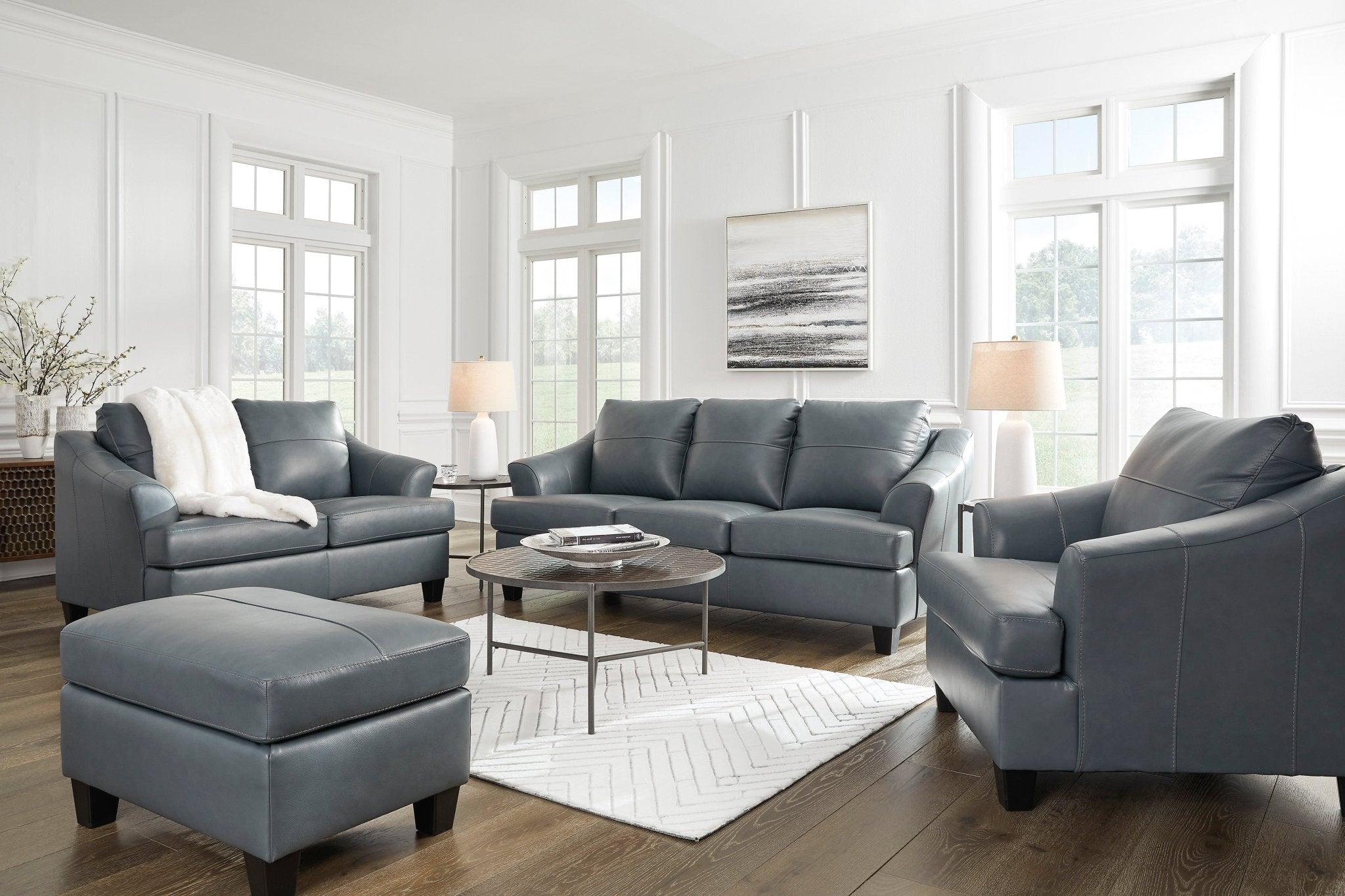 Genoa Genuine Leather Oversized Chair & Ottoman - Rooms For Less Furniture Outlet